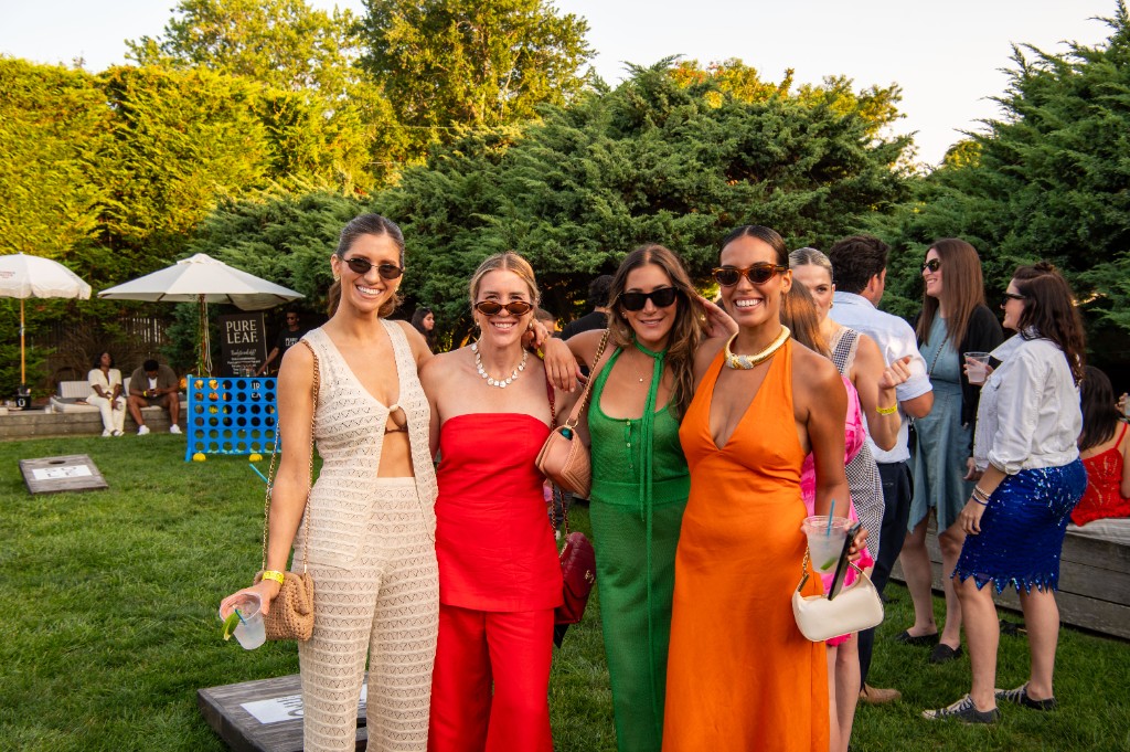 Guests on the lawn near Pure Leaf Tea lawn games at the Endless Summer Party